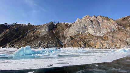 Ice hummocks of Lake Baikal. Large, impenetrable chunks of ice. Northern landscape of frozen Lake Baikal.