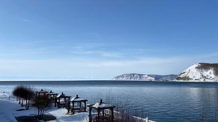 The non-freezing Angara river near Lake Baikal. Northern landscape of frozen Lake Baikal.