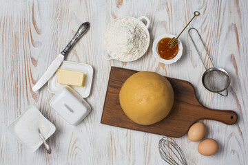 Honey cake preparing and ingredients flour, butter, eggs and honey