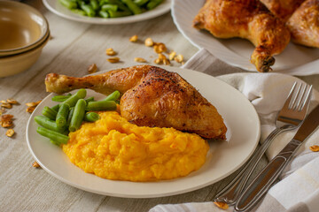 Roasted chicken with mashed pumpkin puree and green beans