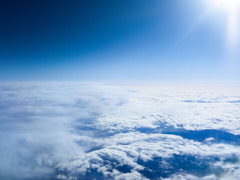 Sea of clouds view from airplane window in tropopause (Japan)