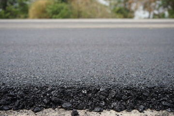 The blur of the asphalt road