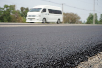 The blur of the asphalt road