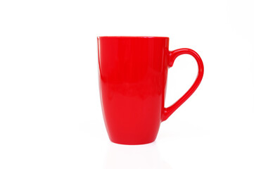 Red mug for tea or coffee on a white background