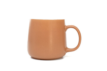 Brown mug for tea or coffee on a white background.