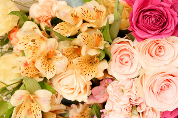 Beautiful floral flat lay, fresh flowers background. Spring, summer concept