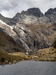 Horse in a moody mountain landscape in Huaraz hike in Peru	