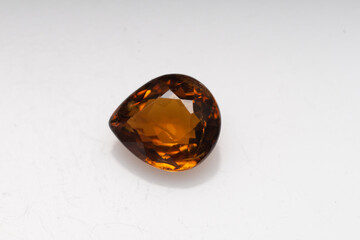 Natural gemstone garnet grossular on white background