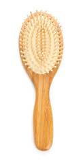 Wooden hair brush on white background