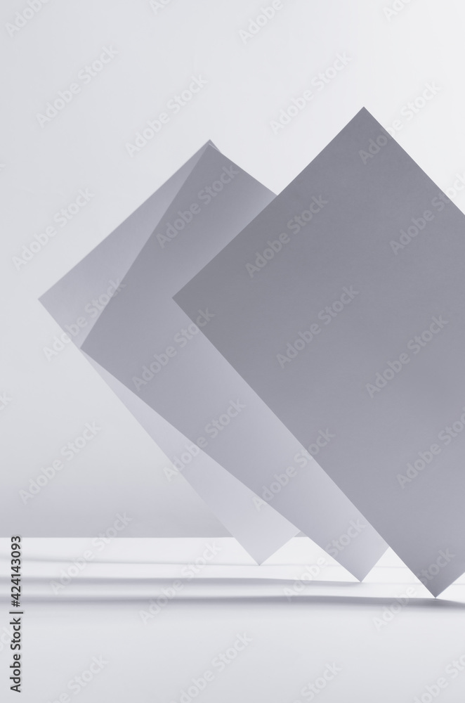 Poster modern simple geometric white grey abstract background with asymmetric standing papers with perspect