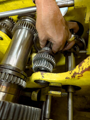 Retrofit gear and shaft in head stock of lathe machine.
