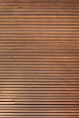 Wooden background, empty surface. modern boards are dark brown. Wooden photophone in rustic style