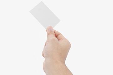 Man's hand holding a white business card isolated on white background