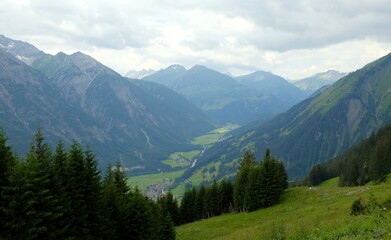 Beautiful alpine landscape with green meadows, alpine cottages and mountain peaks, Lechtal, Lech, Austria