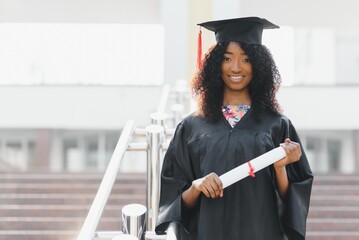 Excited African American woman at her graduation.