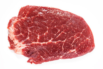 piece of raw meat on white plate, grain-fed marbled beef, top view, best meat for steaks
