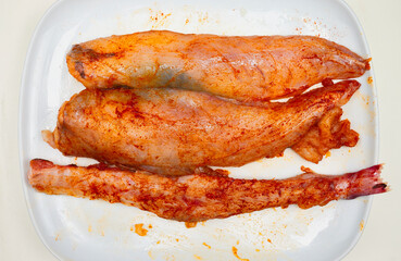 Piece of monkfish marinated with paprika. It is one of the tastiest fish, with a taste similar to...