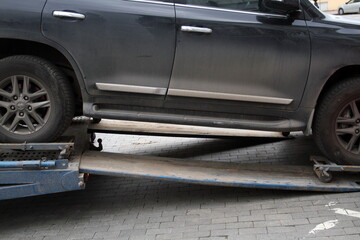 the car is taken by a tow truck