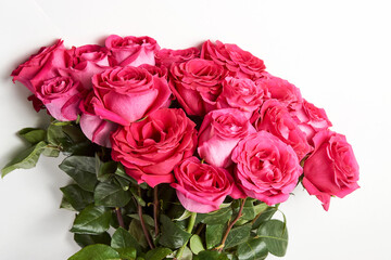 Bouquet of pink roses on white background with copy space