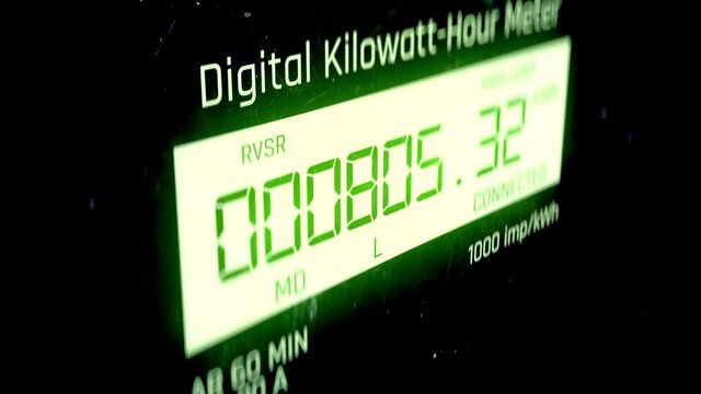 Modern electric meter measuring electrical energy consumption, utility billing
