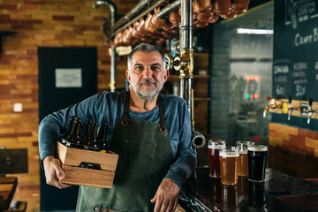 bartender serving beer in pub