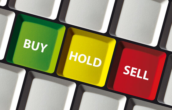 Buy hold sell button on computer keyboard - concept stock exchange invest trade