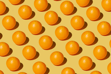 repeated orange on a yellow background - 424163645