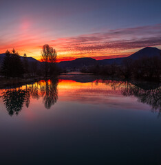 Naklejka premium sunrise over the river