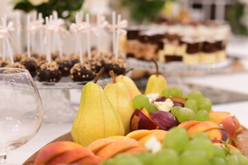 Obraz na płótnie Canvas Fruits and cakes catering