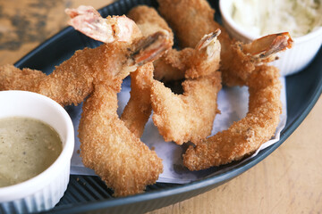 tasty fried king prawn in a plate on table 