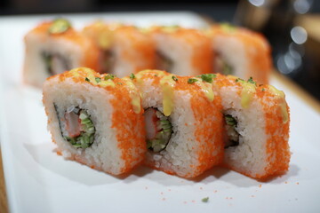 Sushi rolled sliced fish eggs also known as tobiko, masago, ikura