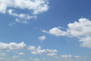 Beautiful cloudscape over horizon. Blue sky and clouds.
