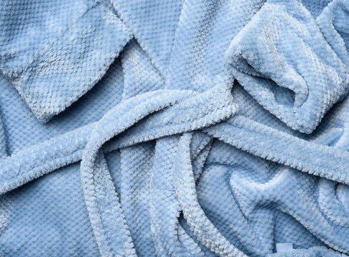 A Fragment Of A Gray-blue Plush Robe With A Belt