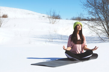 girl meditates outdoors. yoga concept