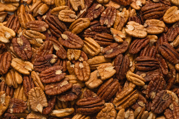Tasty pecan-nut background. Top view.