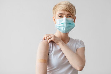 Woman getting vaccinated immunity to covid-19, recommended inoculation, coronavirus program