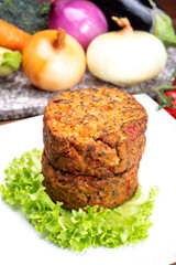 Round vegetarian patties or burgers made from grains, vegetables and legumes
