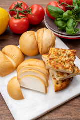 Cheese collection, Italian yellow smoked caciocavallo or scamorza cheese