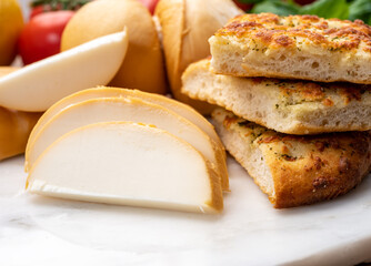 Cheese collection, Italian yellow smoked caciocavallo or scamorza cheese