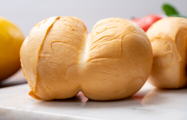 Cheese collection, Italian yellow smoked caciocavallo or scamorza cheese