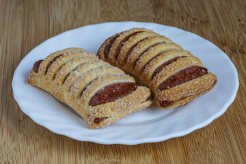 Tasty cookies with apple jam closeup.