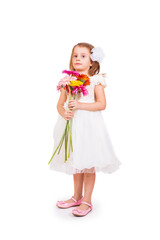 Cute little girl with flowers on white background
