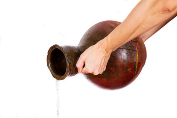 A tilted vessel from which water flows on a white background