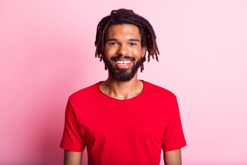 Photo of young handsome african man happy positive smile wear casual outfit isolated over pink color background