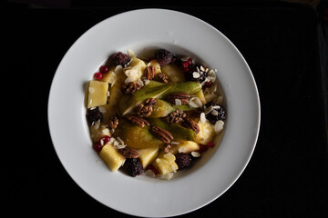WHITE DISH HEALTHY BREAKFAST FRUITS & NUTS 