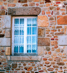Windows in stone wall