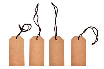 four cardboard tags with threads on a white background