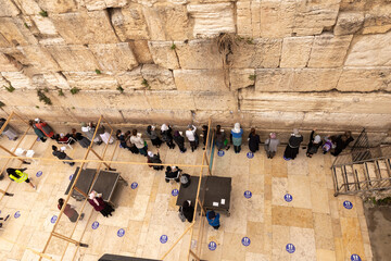 Jews pray on the women side of the Western Wall. View from the stairs leading to the Maghreb Gate of the Temple Mount, near the Western Wall, in the old city of Jerusalem, Israel