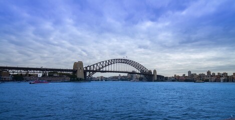 Naklejka premium Panoramic view of Sydney Harbour NSW Australia on a nice sunny and partly cloudy Morning 