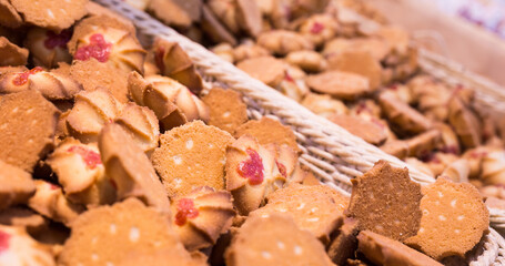 crispy cookies in wicker baskets on the counter